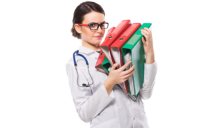 Nurse struggling with paperwork